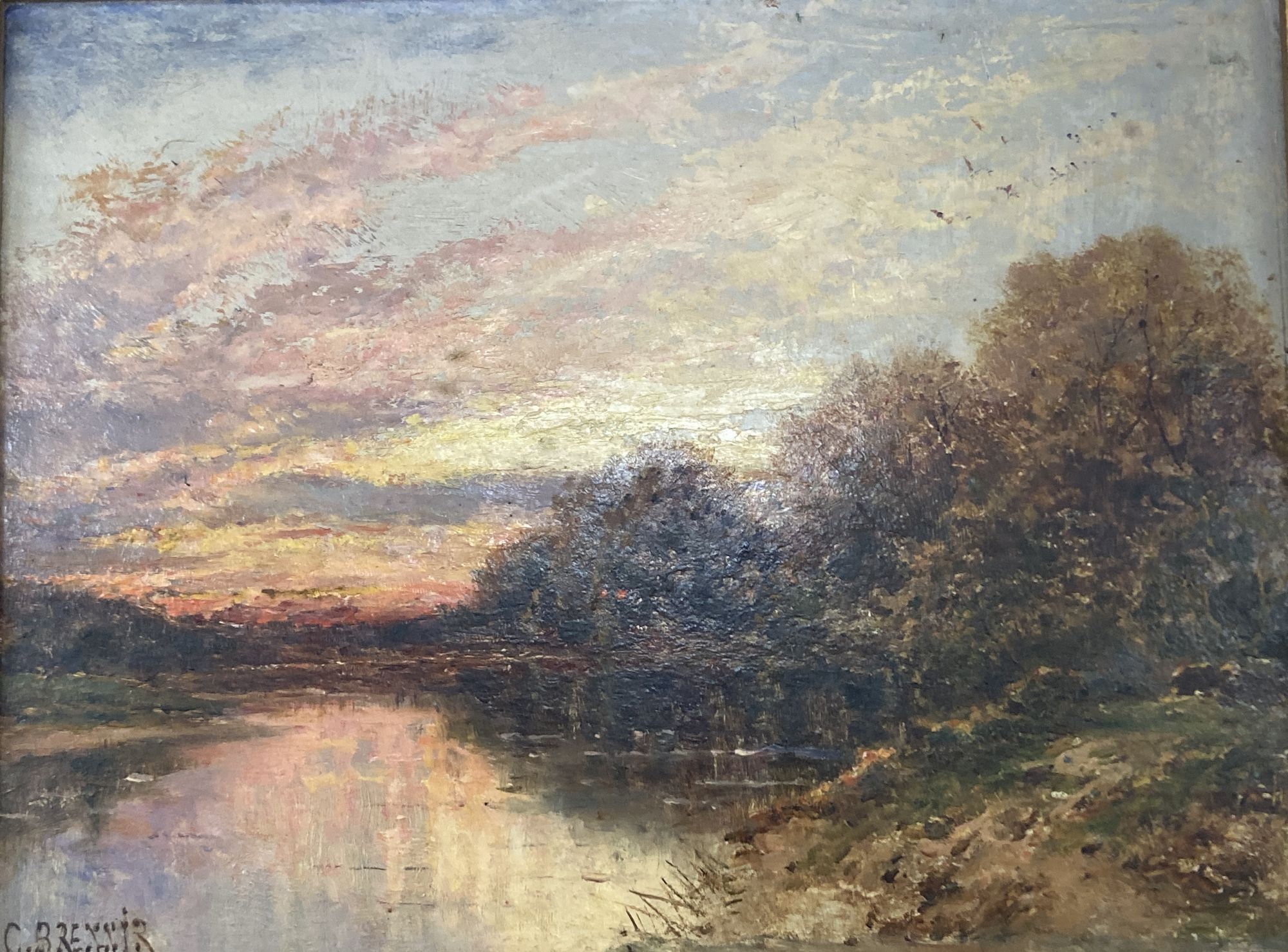 Carl Brennir (1850-1920), oil on mill board, River landscape at sunset, signed, 22 x 30cm